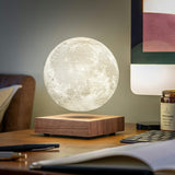 Gingko Floating moon lamp floating on a desk